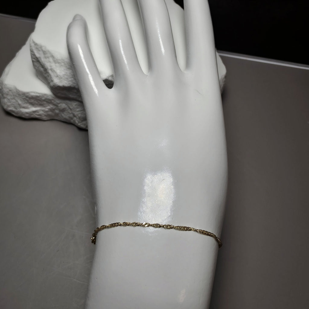 10K Yellow Gold 1.2mm Singapore Bracelet 7"