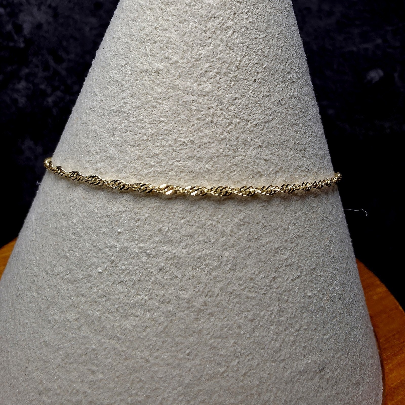 10K Yellow Gold 1.2mm Singapore Bracelet 7"
