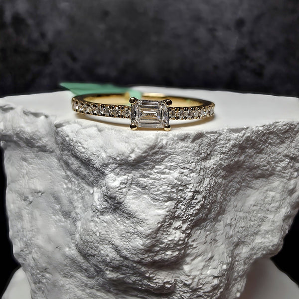 0.33 CTW Emerald Cut Lab Grown Diamond Ring in (Size 7) Gold Over 925 Sterling