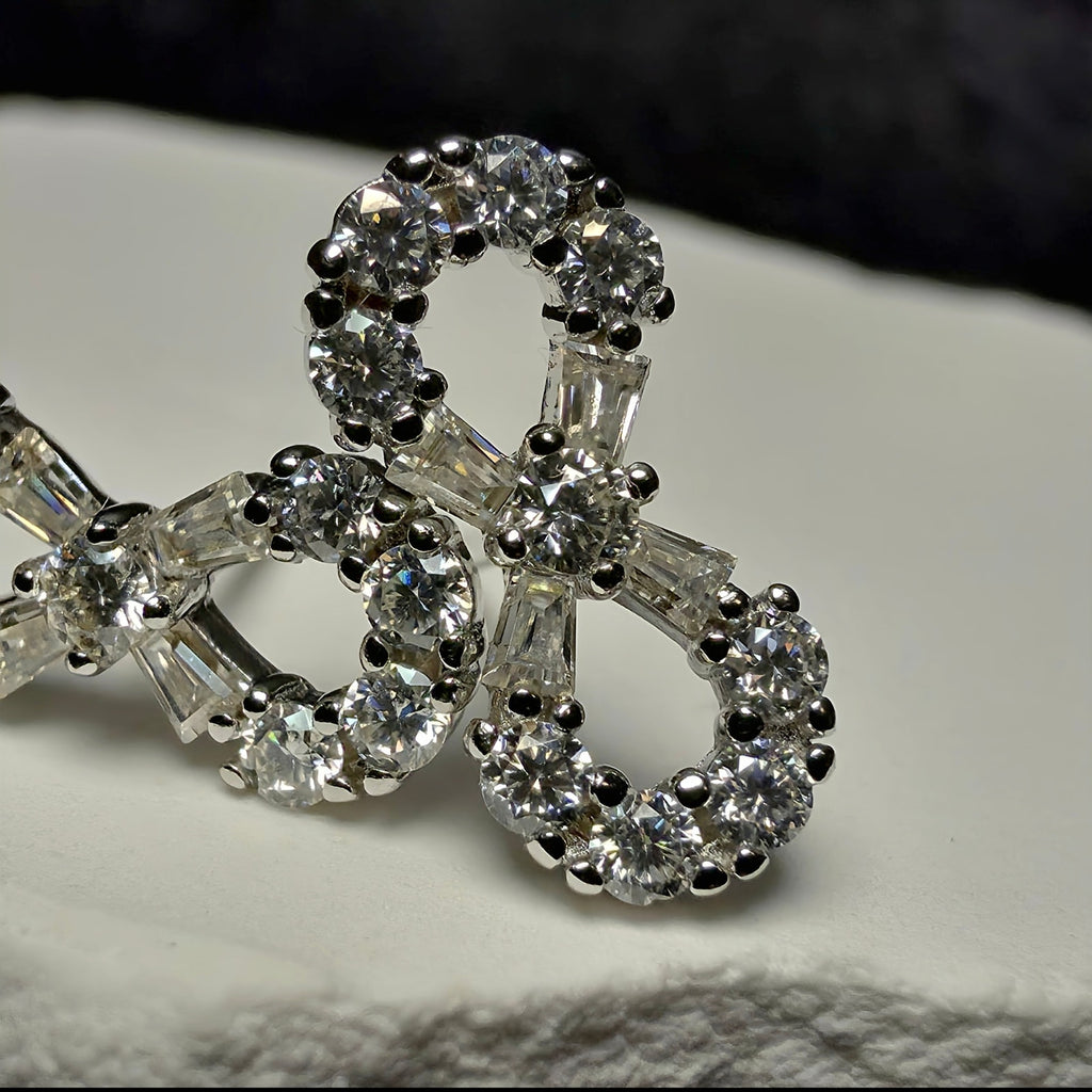 0.50 CTW Moissanite Infinity Stud Earrings in 925 Sterling Silver
