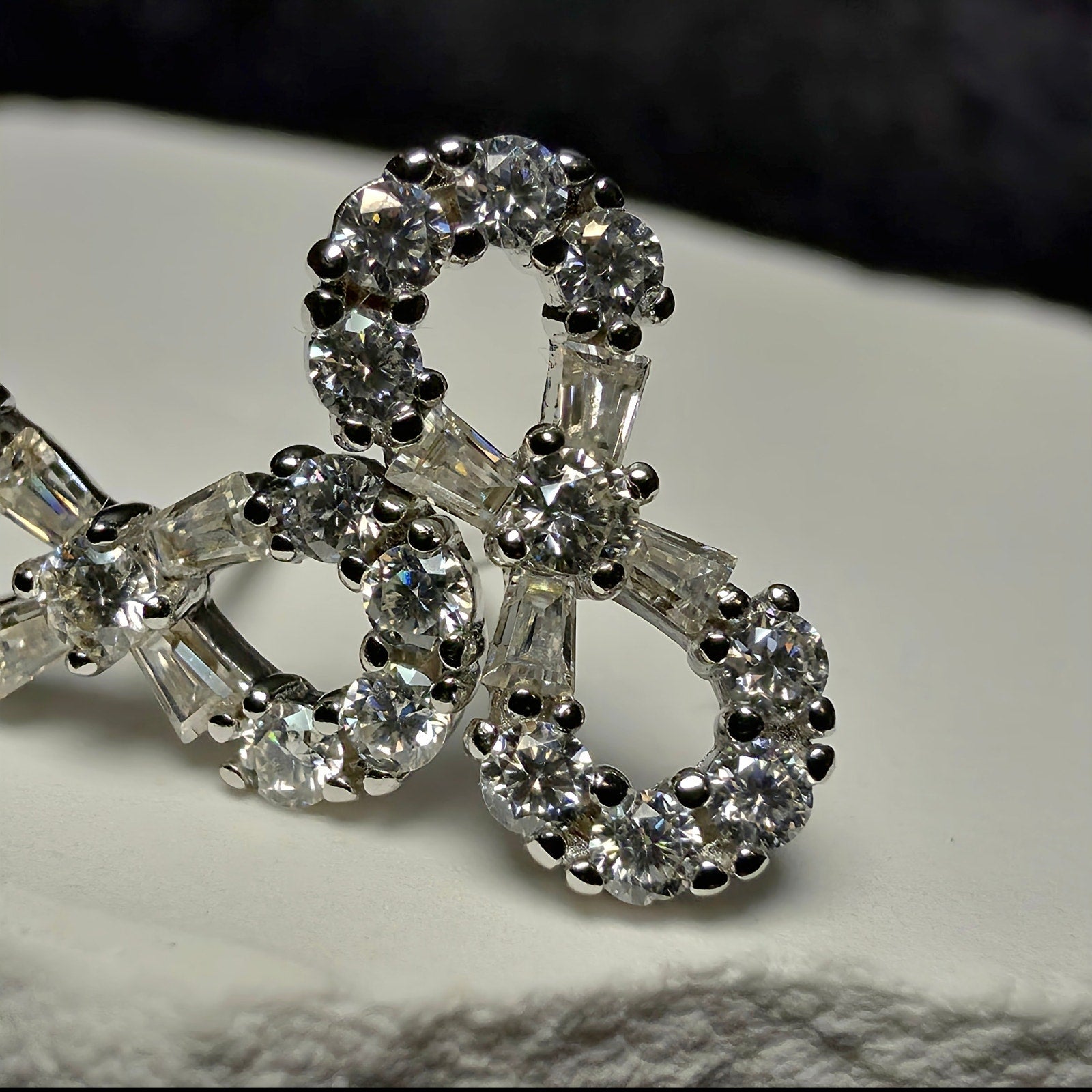 0.50 CTW Moissanite Infinity Stud Earrings in 925 Sterling Silver
