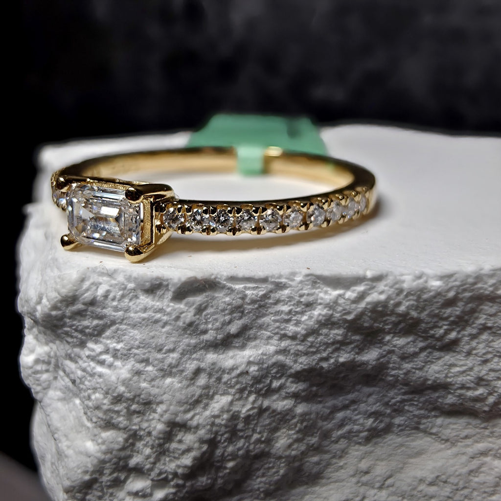 0.33 CTW Emerald Cut Lab Grown Diamond Ring in (Size 7) Gold Over 925 Sterling