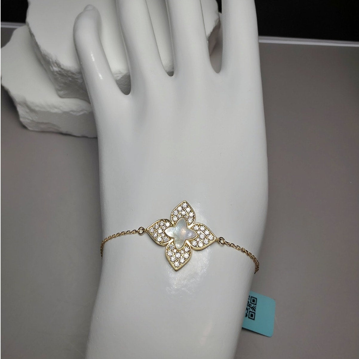 1.08 CTW Moissanite & Mother of Pearl Floral Bracelet in Gold Over Silver