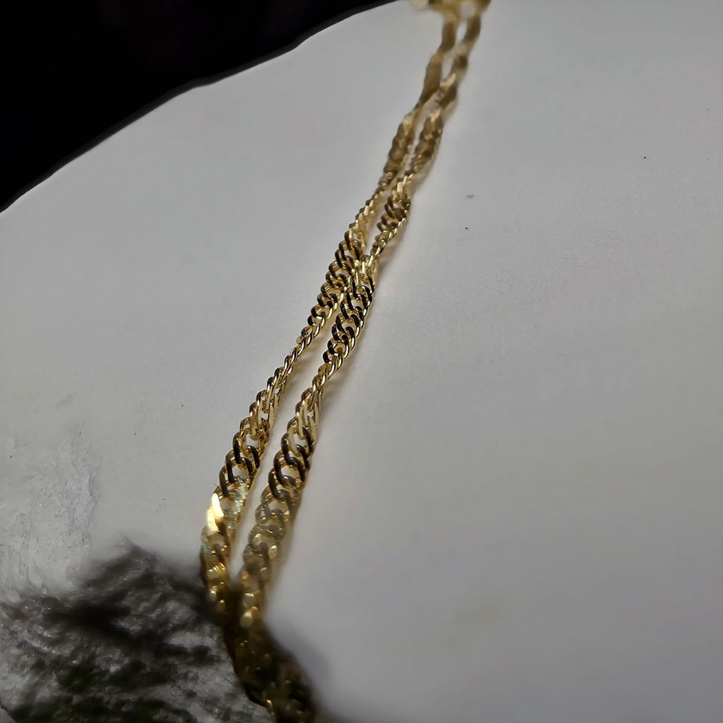 10K Yellow Gold 1.2mm Singapore Bracelet 7"