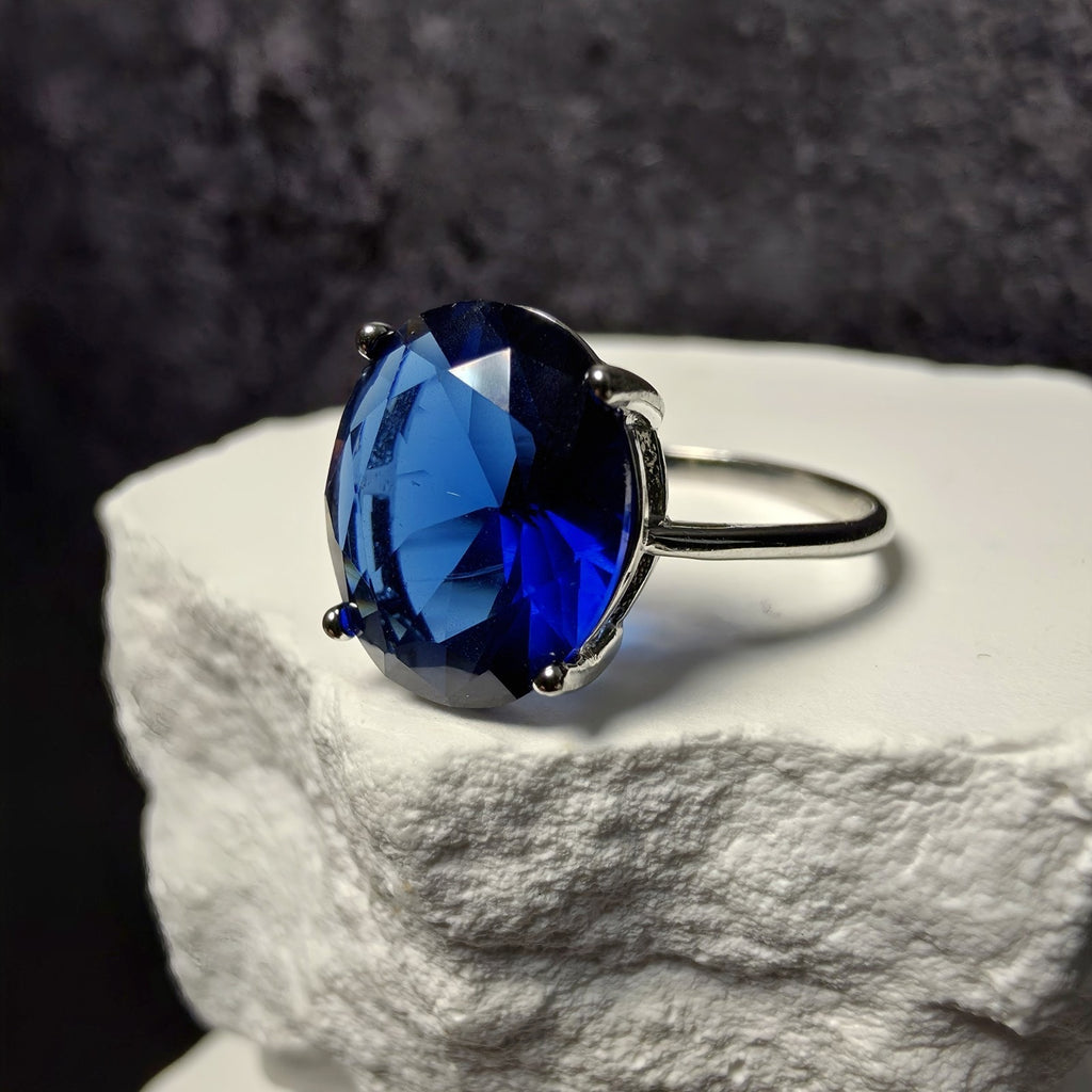 Oval Simulated Blue Sapphire Solitaire Ring in 925 Sterling Silver (Size 8)