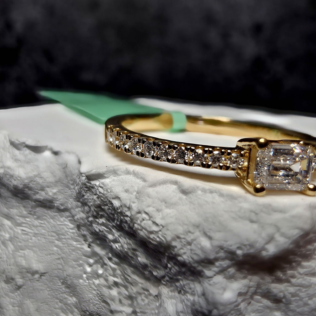 0.33 CTW Emerald Cut Lab Grown Diamond Ring in (Size 7) Gold Over 925 Sterling
