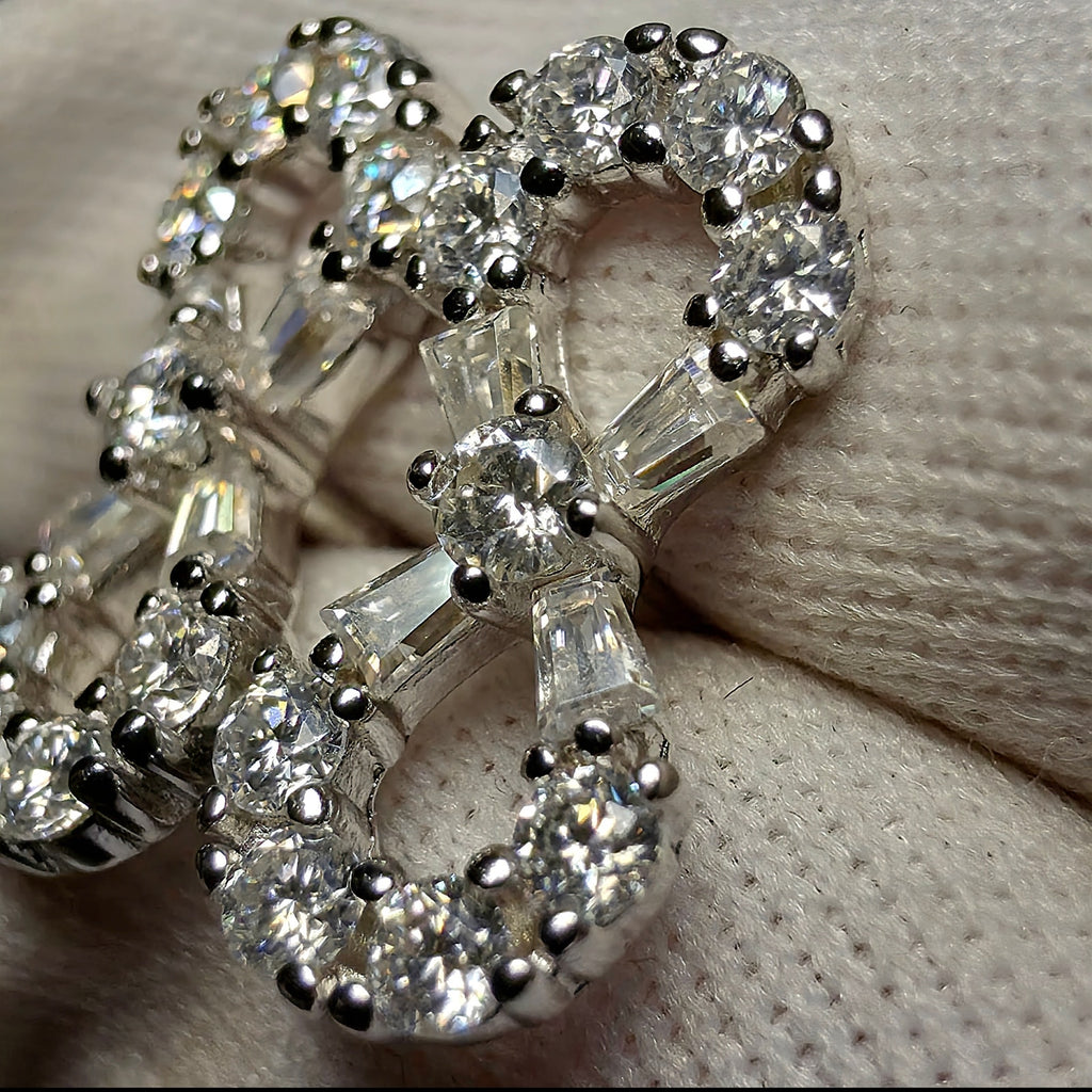 0.50 CTW Moissanite Infinity Stud Earrings in 925 Sterling Silver