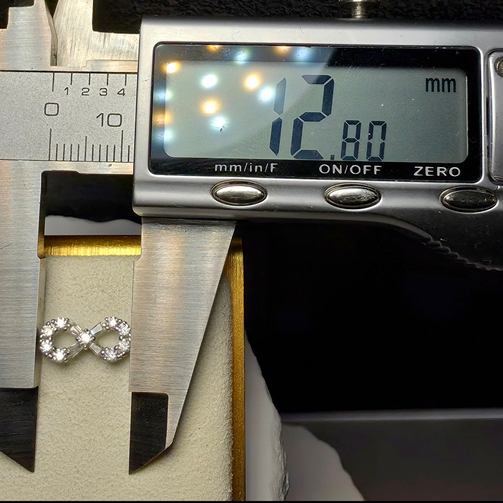 0.50 CTW Moissanite Infinity Stud Earrings in 925 Sterling Silver