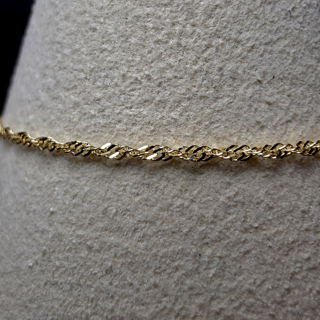 10K Yellow Gold 1.2mm Singapore Bracelet 7"