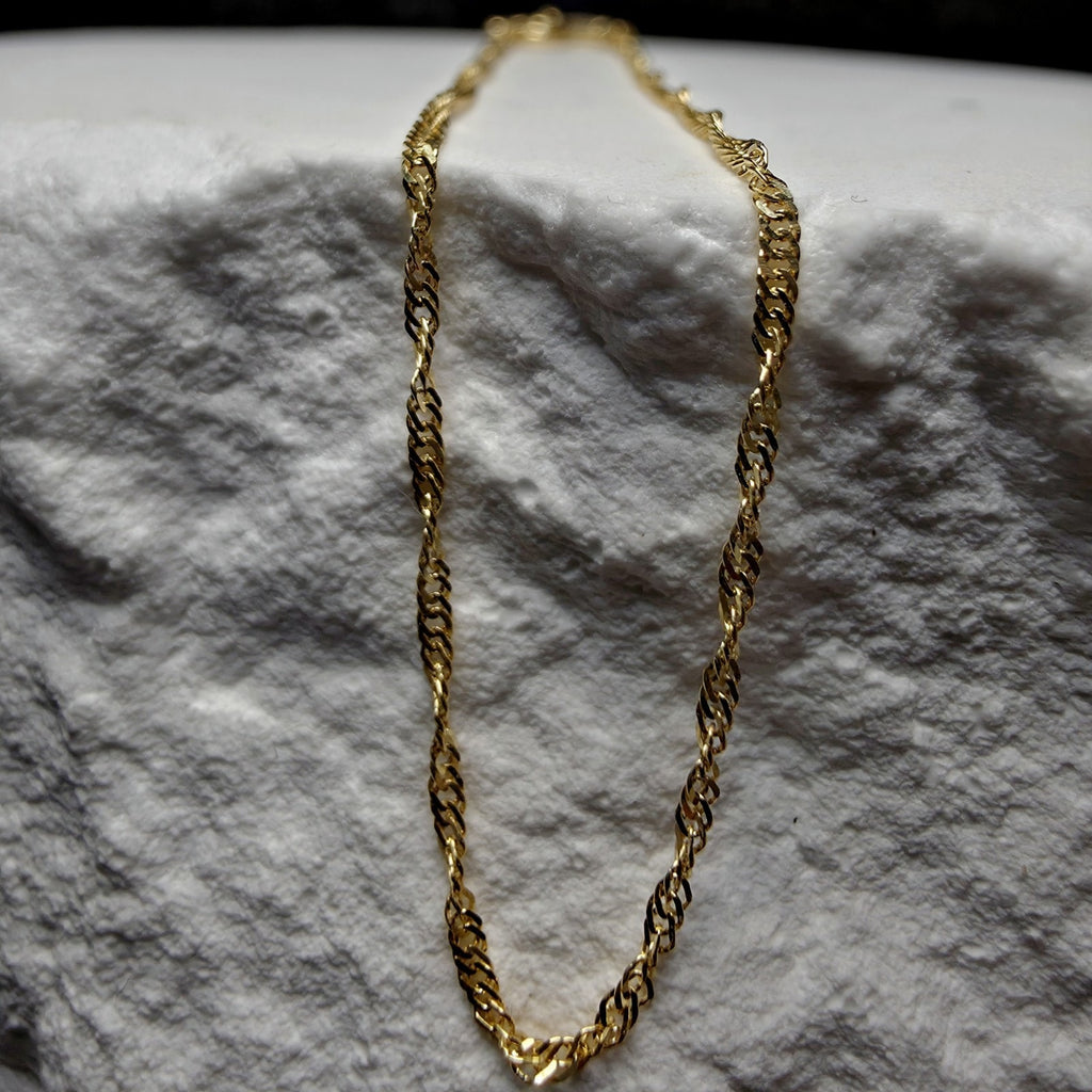10K Yellow Gold 1.2mm Singapore Bracelet 7"